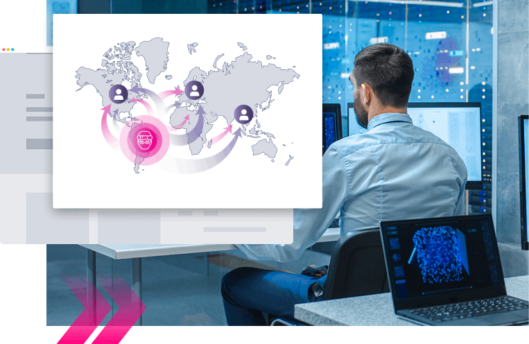 A man in an office with computer screens examines a world map infographic, highlighting global network connections between users—a potential SEO poisoning use case.